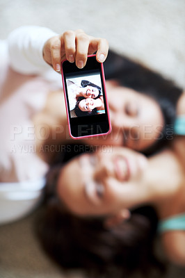 Buy stock photo Girl, friends and phone screen for selfie, smile or profile picture together with facial expression in home. Happy, teenager and above for photo, memory or online social media post in house lounge