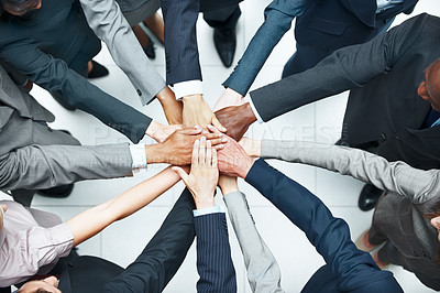 Buy stock photo Business, team and huddle in office with hands together, diversity and synergy for collaboration. Above, people and solidarity in workplace with corporate goals, support and cooperation for company.