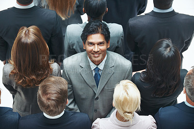 Buy stock photo Corporate, selection and portrait with happy man in crowd for job opportunity or talent above. Top view, businessman or employee with smile in audience for onboarding pick, recruitment or identity