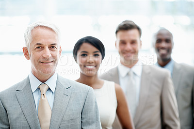 Buy stock photo Row, businessman and smile with team in office for accounting firm, tax professionals and leader. Finance department, group and mature manager in line for business advisory, portrait and experience