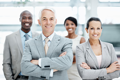 Buy stock photo Confident, portrait and group with arms crossed in office, leader or team with financial development. Corporate, business people and solidarity with colleagues, happy and collaboration for project