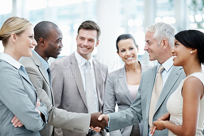 Buy stock photo Team, meeting and handshake with client in office, laughing or agreement for investment opportunity. Corporate, investor and shaking hands with happy people, collaboration and funding negotiation