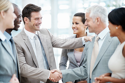 Buy stock photo Business people, support and handshake with client in office, laughing and agreement for investment. Corporate, team and shaking hands with investor, partnership and happy for funding opportunity