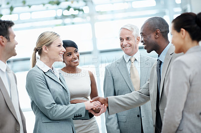 Buy stock photo Business people, discussion and handshake with client in meeting, laugh and agreement for investment. Corporate, teamwork and shaking hands with investor, partnership or happy for funding opportunity