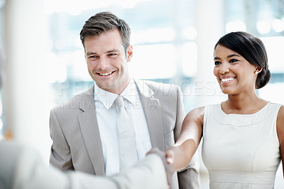 Buy stock photo Business, team or smile with handshake in office building for new hire, staff welcome or onboarding. Happy people, hr managers or shaking hands for first day, career growth and internship opportunity