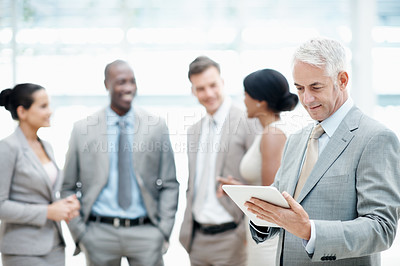 Buy stock photo Corporate, lobby and business man on tablet, finance review, research and investment opportunity. Office, mature and person on digital tech for trading news, budget planning and financial report