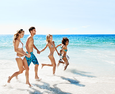 Buy stock photo Running, waves and friends at beach for summer vacation, holiday and weekend together for hangout. Happy, nature and women with man by ocean, splash and outdoor for freedom, island adventure or space
