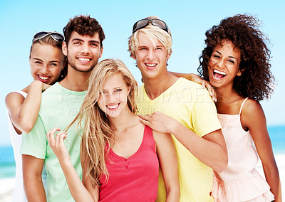 Buy stock photo Happy portrait and travel with friends at beach for summer vacation, bonding and smile together. Tropical getaway, tourism and weekend break with group of people outdoor for social reunion and trip
