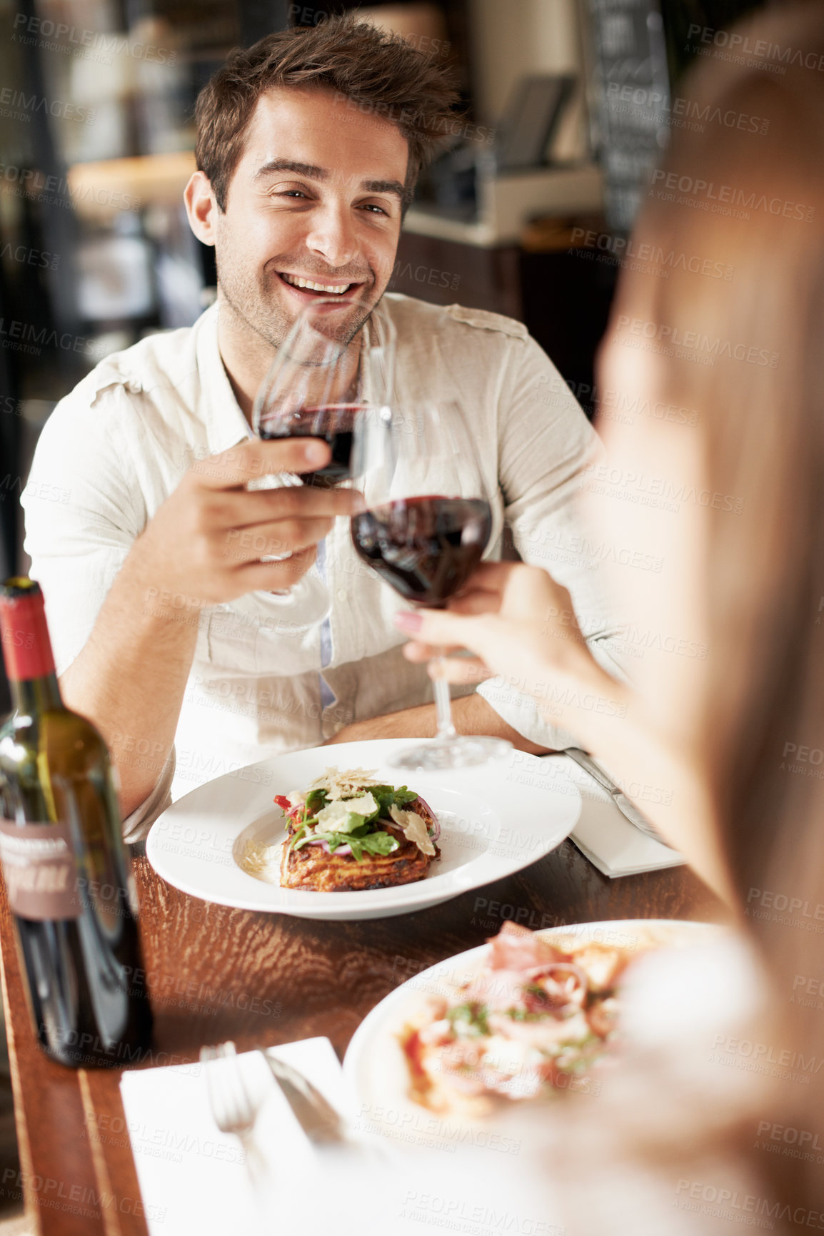 Buy stock photo Man, couple and toast in restaurant with wine, anniversary date or connection for bonding together. Happy people, romantic relationship and cheers at lunch with alcohol beverage, celebration or love.