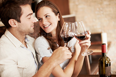 Buy stock photo Happy, couple and cheers in restaurant with wine, relationship milestone and goals for commitment. People, dating and toast with alcohol drink for celebration, achievement and smile for connection.