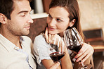 Exchanging flirty glances over dinner