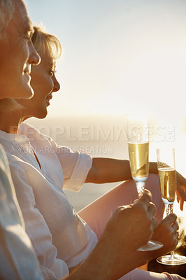 Buy stock photo Outdoor, old couple and sunset with champagne for support, bonding together and love in healthy relationship. Nature, senior man and woman with wine for happy, marriage and care on weekend holiday
