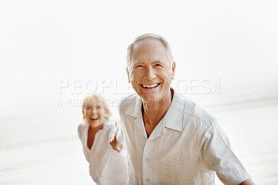 Buy stock photo Man, couple and holding hands on beach with portrait, guidance and leading on holiday. Mature people, space and follow at ocean with trust, support and relationship bonding with travel for happiness