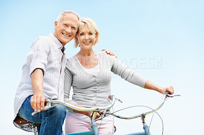 Buy stock photo Portrait, bicycle and hug with old couple in nature for bonding, weekend break and anniversary vacation. Retirement, holiday and travel with senior man and woman on bike outdoor for marriage space