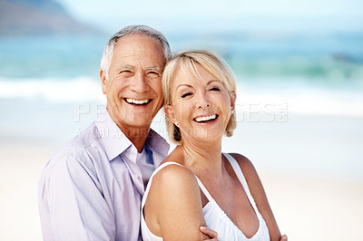 Buy stock photo Portrait, hug and mature couple at beach with happiness for marriage, relationship and holiday together. Embrace, travel and man with woman by ocean for summer vacation, weekend and bonding for love