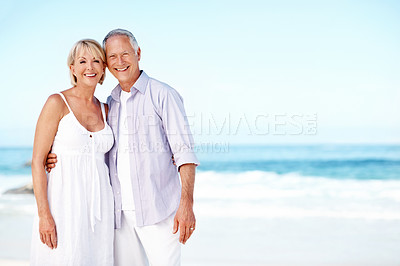 Buy stock photo Portrait, space and mature couple at beach with embrace for marriage, relationship and holiday together. Happy, travel and man with woman by ocean for summer vacation, weekend and bonding for love
