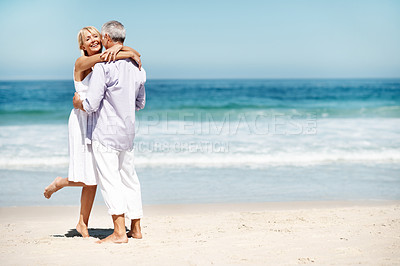 Buy stock photo Support, hug and couple by beach with love on summer vacation, getaway or weekend trip together. Smile, space and mature woman embracing man with safety, bonding or connection by ocean on holiday.