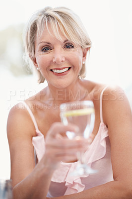 Buy stock photo Portrait, water and senior woman outdoors with positive attitude, smile and relax on weekend break. Happy, elderly person and morning with liquid beverage, optimism and good mood for retirement