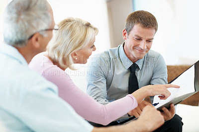 Buy stock photo Document, old couple or consulting with financial advisor in home, investment planning or pension. Happy people, wealth advice or point with paperwork, asset management and retirement savings
