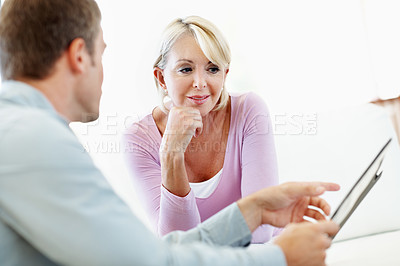 Buy stock photo Happy woman, consultation and financial advisor with paperwork in meeting, talk or investment update. Wealth management, savings and chat with mature person, advice and estate planning with report