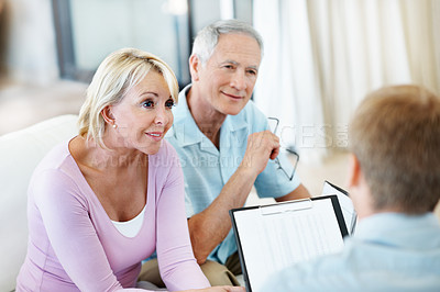 Buy stock photo Document, old couple or pension with financial advisor in home, investment or mortgage planning. Happy people, wealth consultation and talking at house, insurance policy and retirement savings