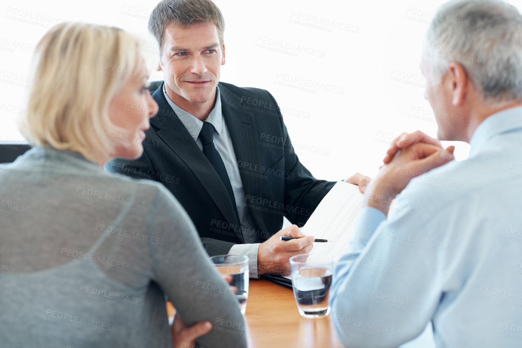 Buy stock photo Old couple, financial advisor and paperwork for agreement, deal and retirement planning in office. Senior man, elderly woman and document for pension fund, loan agent and budget for asset management