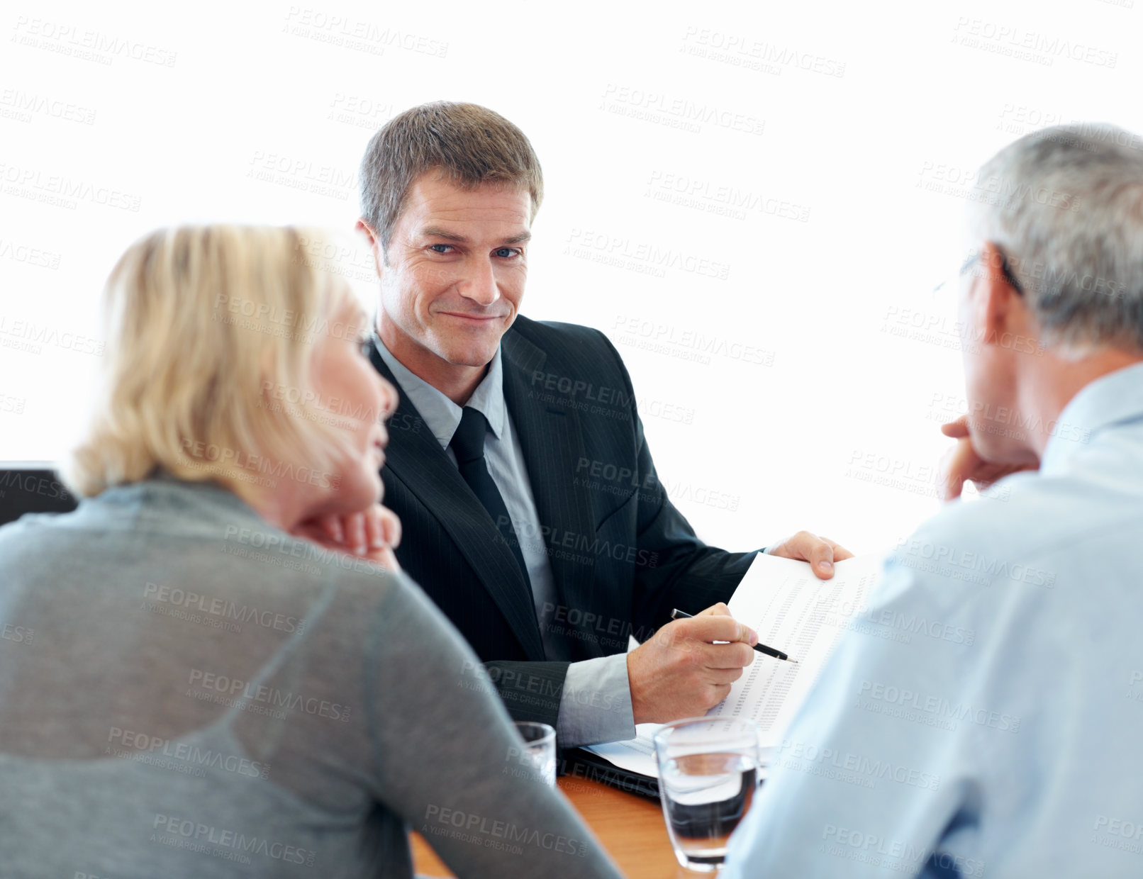 Buy stock photo Elderly couple, financial advisor and paperwork for agreement, deal and retirement planning in office. Senior man, old woman and document for pension fund, loan agent and budget for asset management