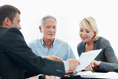 Buy stock photo Happy, senior couple and financial advisor with paperwork, talk or listening to retirement strategy. Old people, meeting and estate planning with wealth manager, explaining and advice with documents