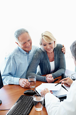 Buy stock photo Healthcare, doctor and old couple in office for paperwork, insurance policy update or survey. Man, elderly people or document in clinic for consultation advice, support or medical history meeting