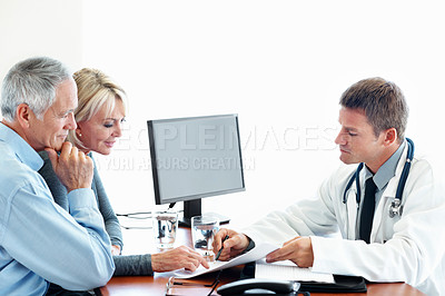 Buy stock photo Doctor, documents and consultation with elderly couple, insurance or medical aid benefits. Healthcare, happy people and consent form in studio, retirement and coverage decision on white background