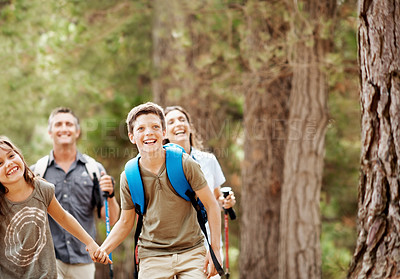 Buy stock photo Parents, laugh and kids in nature with hiking gear, joke and adventure outdoor for bonding together. Space, happy mother and father in woods with funny children, trekking or holding hands for support