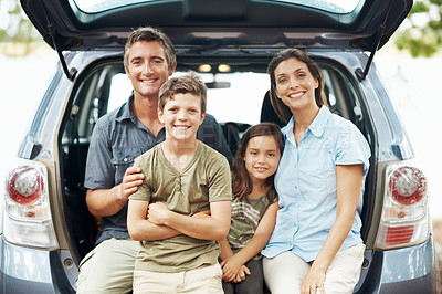 Buy stock photo Portrait, parents and children in nature with car, relax and smile for bonding together on weekend. Happy people, mother and father outdoor with kids, family rest and vehicle for road trip adventure.