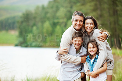 Buy stock photo Smile, nature and portrait of family on holiday, getaway or weekend trip with bonding together. Happy, outdoor and parents with children in forest for adventure, connection or love on vacation.