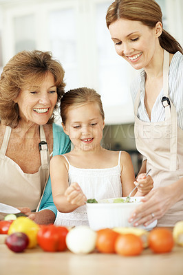 Buy stock photo Salad, grandmother and child with mom in home for learning, meal prep and help with lunch. Kitchen, generations and happy girl with ingredients, vegetables and healthy dinner with family together