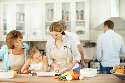 Buy stock photo Family, cooking and children in kitchen with book for recipe, culinary skills and ingredients for lunch. Generations, home and girl with mom, grandma and learning for help with dinner and meal prep