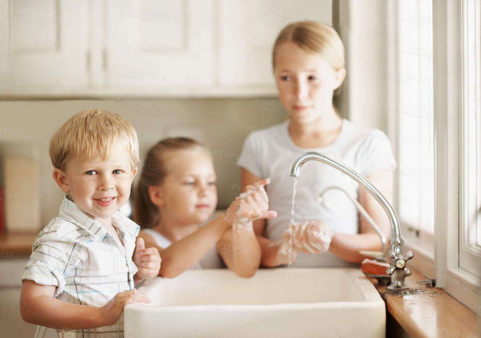 Buy stock photo Family, portrait and children in bathroom washing hands for hygiene, wellness and cleaning with siblings. Smile, happy and boy by sink for soap, foam and disinfection for germ prevention in home