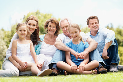 Buy stock photo Family, generations and bonding with children in nature, happy or reunion with grandparents on grass. Outdoor, senior people and parents with kids on weekend, portrait and relax with smile at park