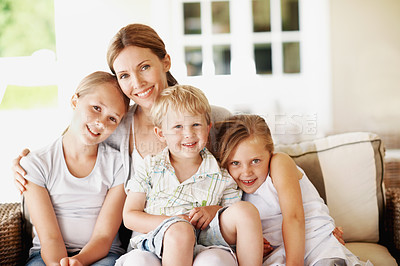 Buy stock photo Smile, relax and portrait of mother with children in home for bonding, support or connection. Love, happiness and calm with woman and kids on patio of family house for care, commitment or trust