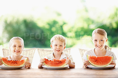 Buy stock photo Happy, portrait and children with watermelon in backyard for healthy snack, food and eating in summer. Family, siblings and kids with fruit for wellness, diet and nutrition for weekend outdoor