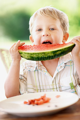 Buy stock photo Watermelon, eating and portrait with boy outdoor of house for summer, calm and holiday. Fourth of July, food and relax with child and fruit in backyard of home for vacation, nutrition and snack