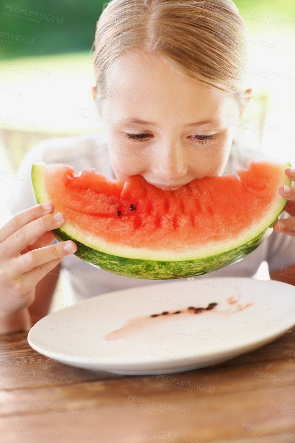 Buy stock photo Eating, watermelon and summer with child outdoor of home for wellness, organic diet and vitamins. Growth, healthy snack and nutrition with kid and fruit in backyard of house for food and hunger