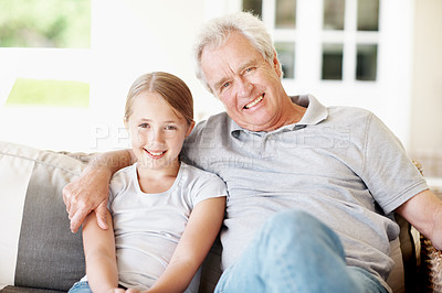 Buy stock photo Portrait, relax and grandfather with child on sofa in home for bonding, support and connection. Love, family visit and weekend break with senior man and kid in apartment for trust, happy and care