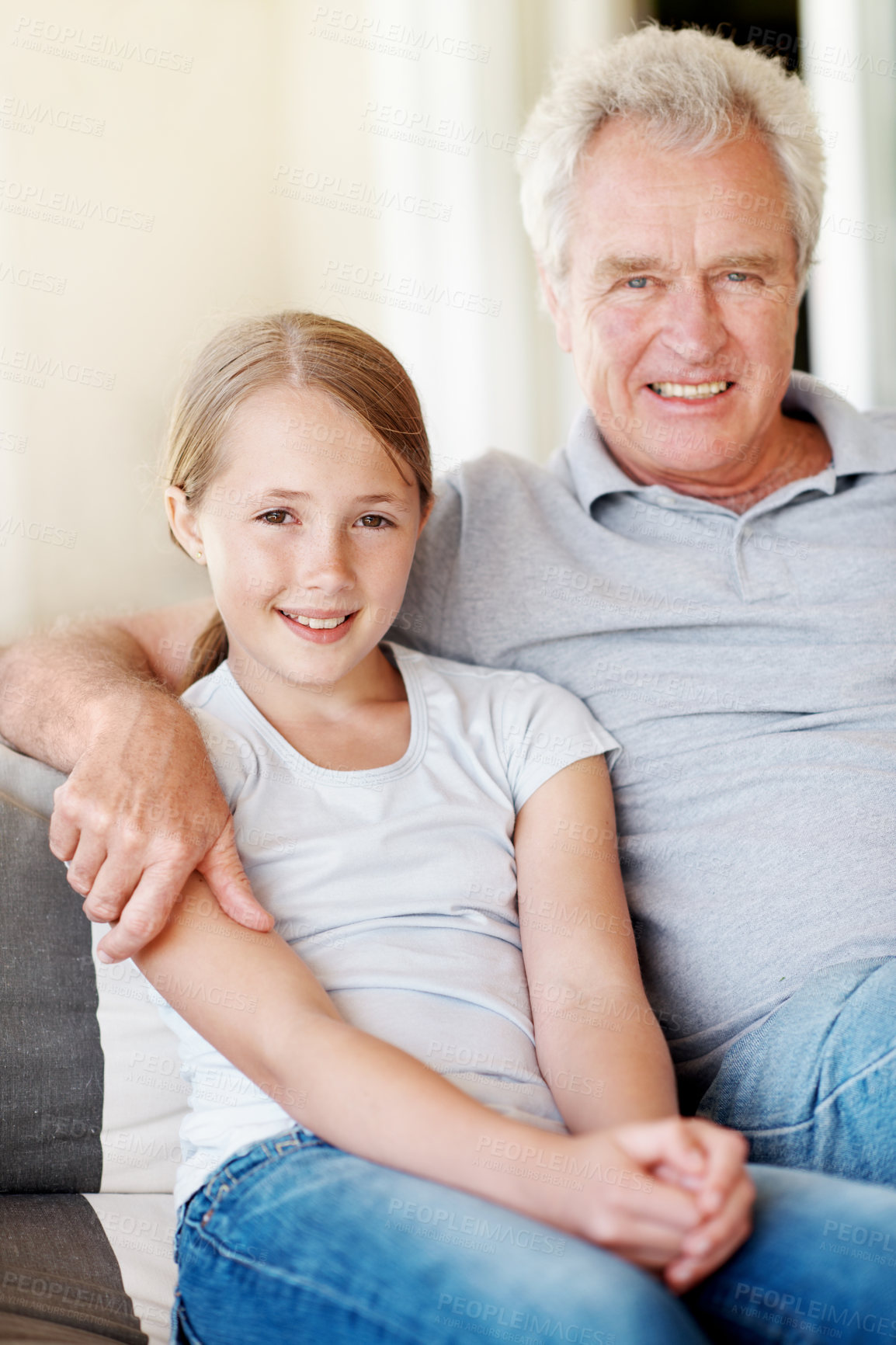 Buy stock photo Portrait, love and grandfather with child on sofa in home for bonding, support and connection. Happy, family visit and weekend break with senior man and kid in apartment for trust, relax and care