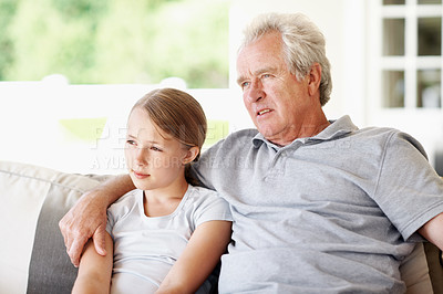 Buy stock photo Love, thinking and grandfather with child on sofa in home for bonding, support and connection. Relax, family visit and weekend break with senior man and kid in apartment for trust, vision and care
