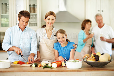 Buy stock photo Parents, smile and cooking with child in kitchen, support and learning culinary skills in apartment. Family, portrait and meal prep with kid, love and happy people with recipe for lunch in house