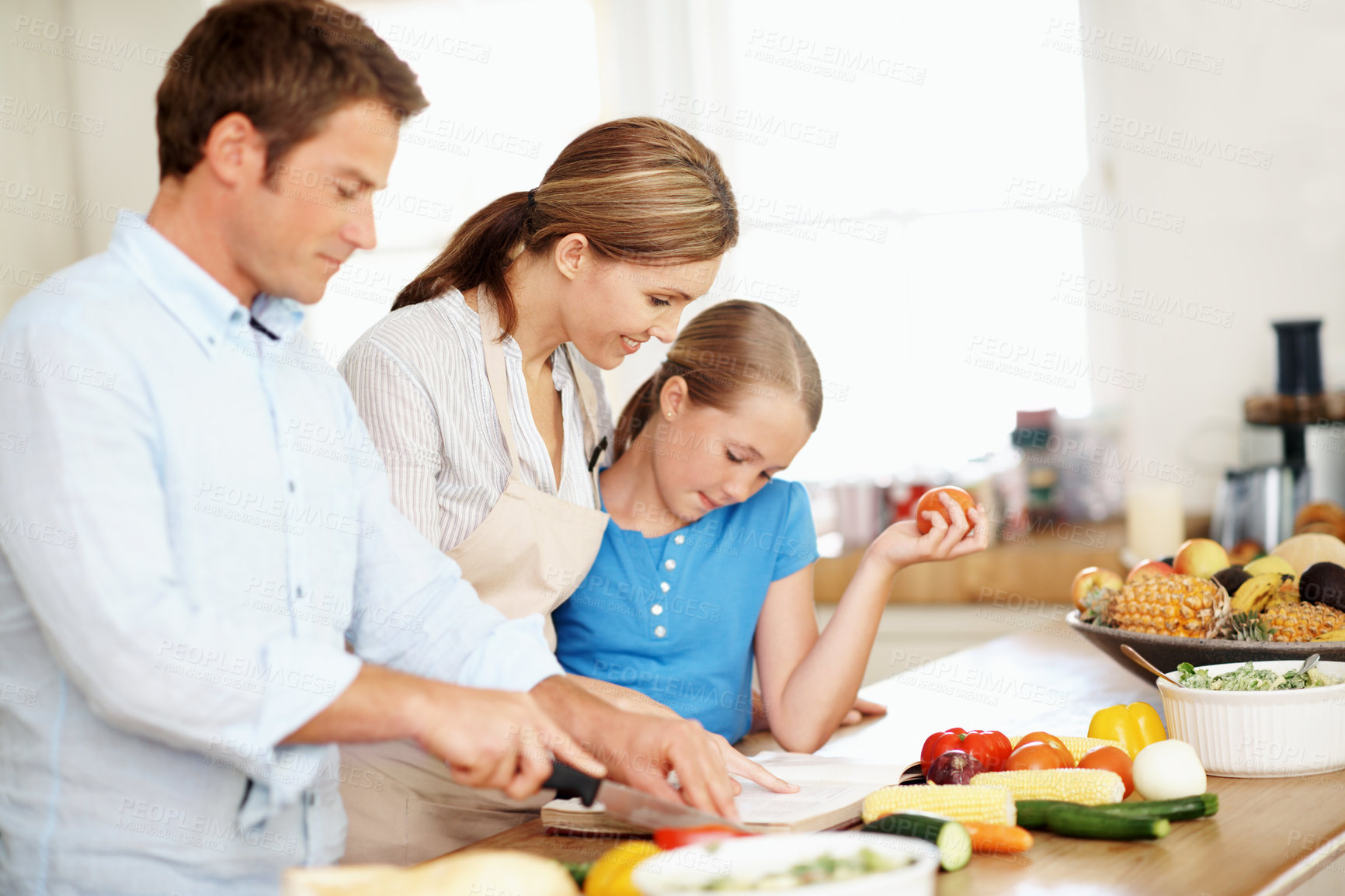Buy stock photo Parents, recipe and cooking with child in kitchen, together or learning culinary skills in apartment. Family, portrait and meal prep with kid, love and happy people with ingredients for lunch in home