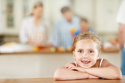 Buy stock photo Happy, portrait and child with arms crossed in kitchen, relax or girl with positive attitude in home. Childhood, development and kid with smile, stress free and confident with good mood in house