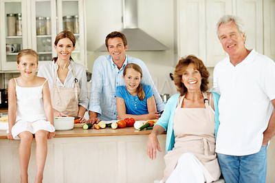 Buy stock photo Grandparents, parents and children in kitchen for cooking, bonding and help for family lunch. Happy, portrait and girls with mom, dad and senior generation for meal prep, dinner or vegetables in home