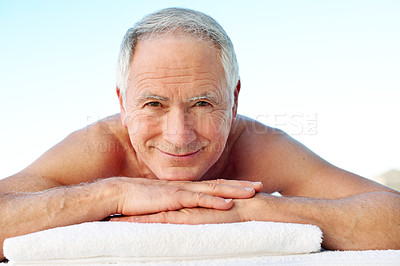Buy stock photo Portrait, relax and senior man at spa for holiday, getaway or weekend trip for calm at resort. Smile, therapy and elderly person in retirement with treatment for health, wellness or zen on vacation.