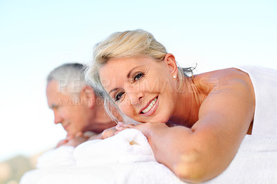 Buy stock photo Happy woman, old couple and relax at massage spa, outdoor resort and luxury wellness on holiday. Man, partner and table at salon, peace or health with portrait for vacation in retirement with smile